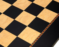 The Queen's Gambit — sortfarvet poppel- og askerød Skakbræt